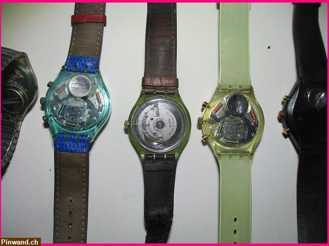 Bild 2: 8 Swatch Uhren