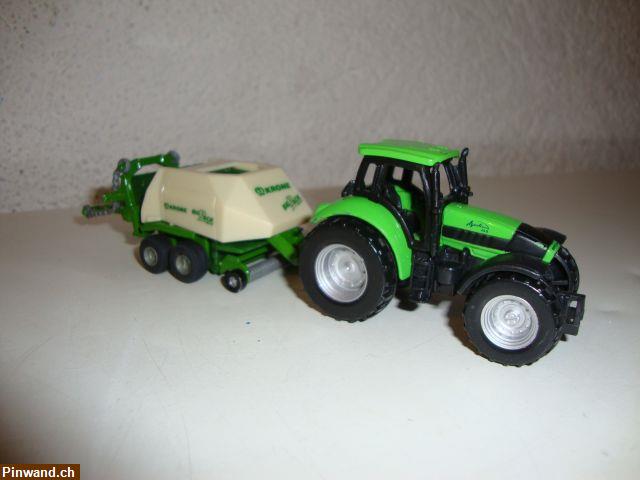 Bild 1: Siku Traktor mit Anhänger zu verkaufen