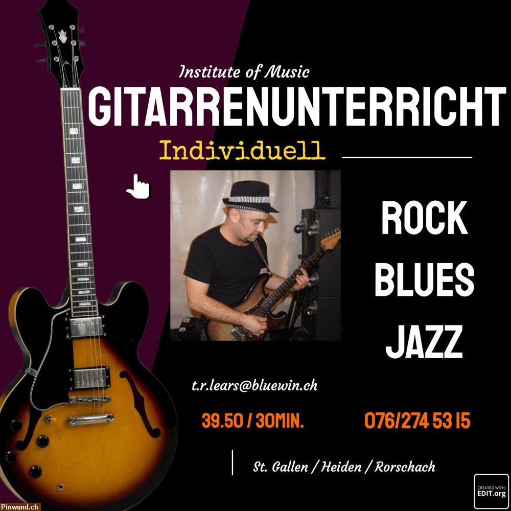 Bild 1: Gitarrenunterricht