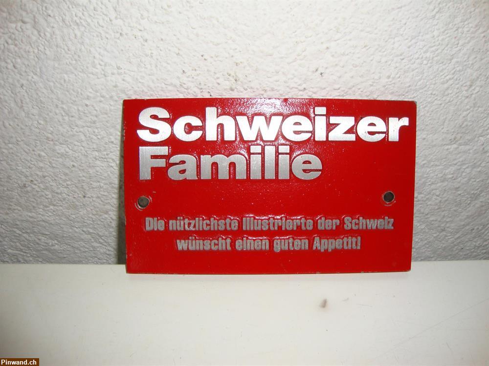 Bild 1: Schild Schweizer Familie zu verkaufen