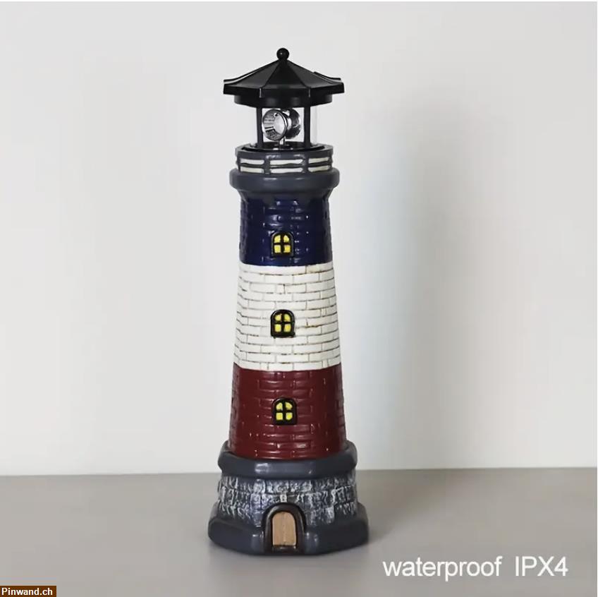 Bild 1: Solarbetriebene schwarze Leuchtturm-Gartenleuchte